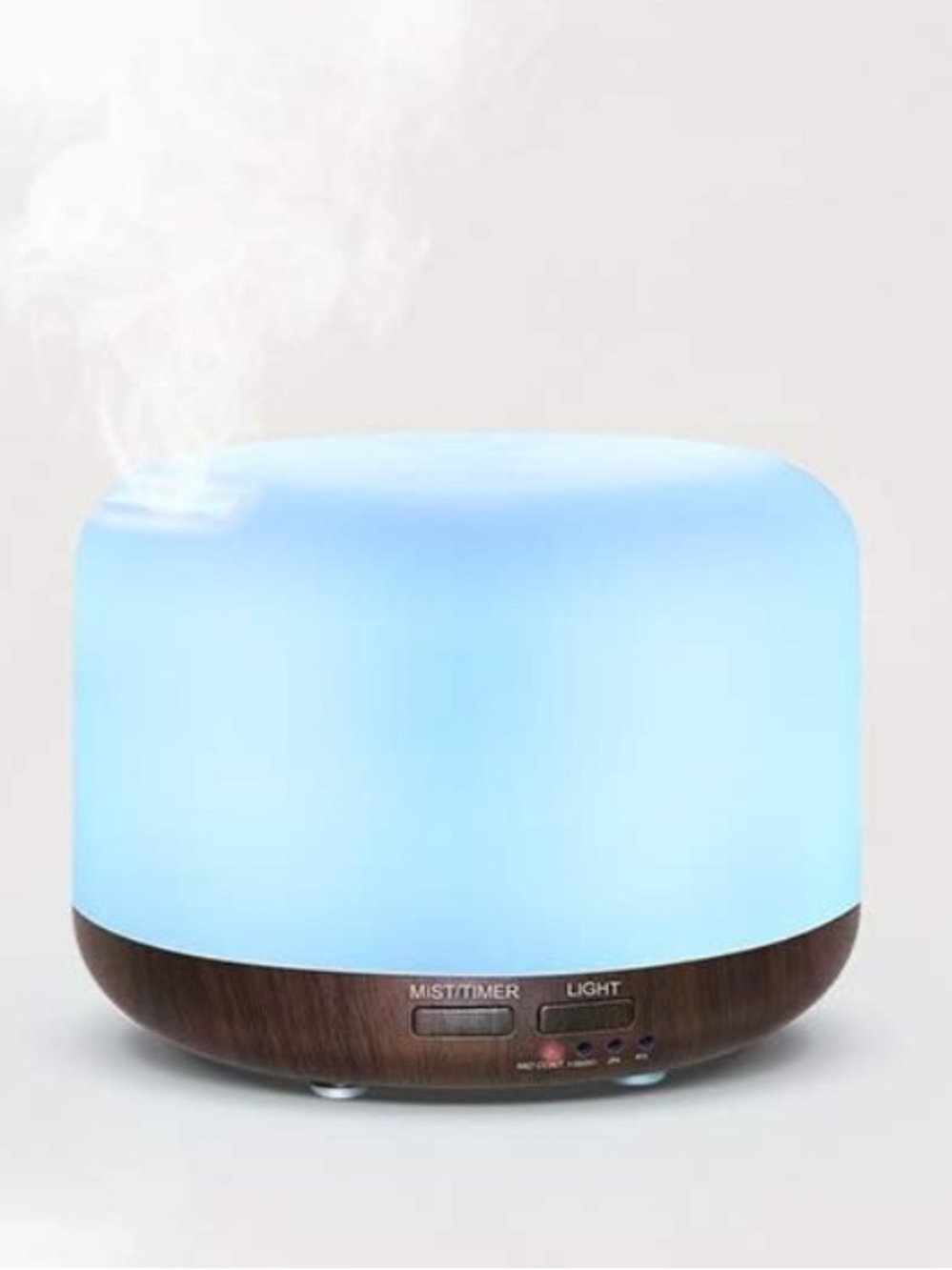 Essential oil diffuser with mist and light for aromatherapy